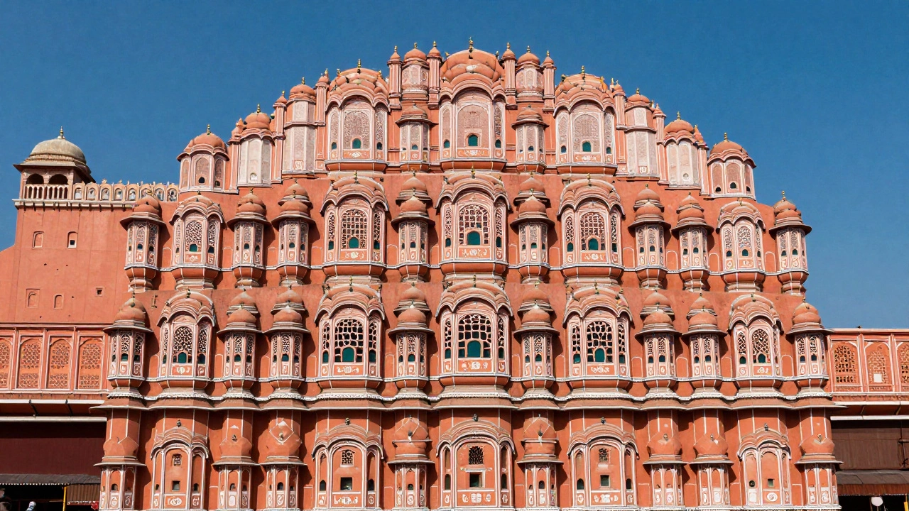 The terracotta-pink facade of the Hawa Mahal palace in Jaipur
