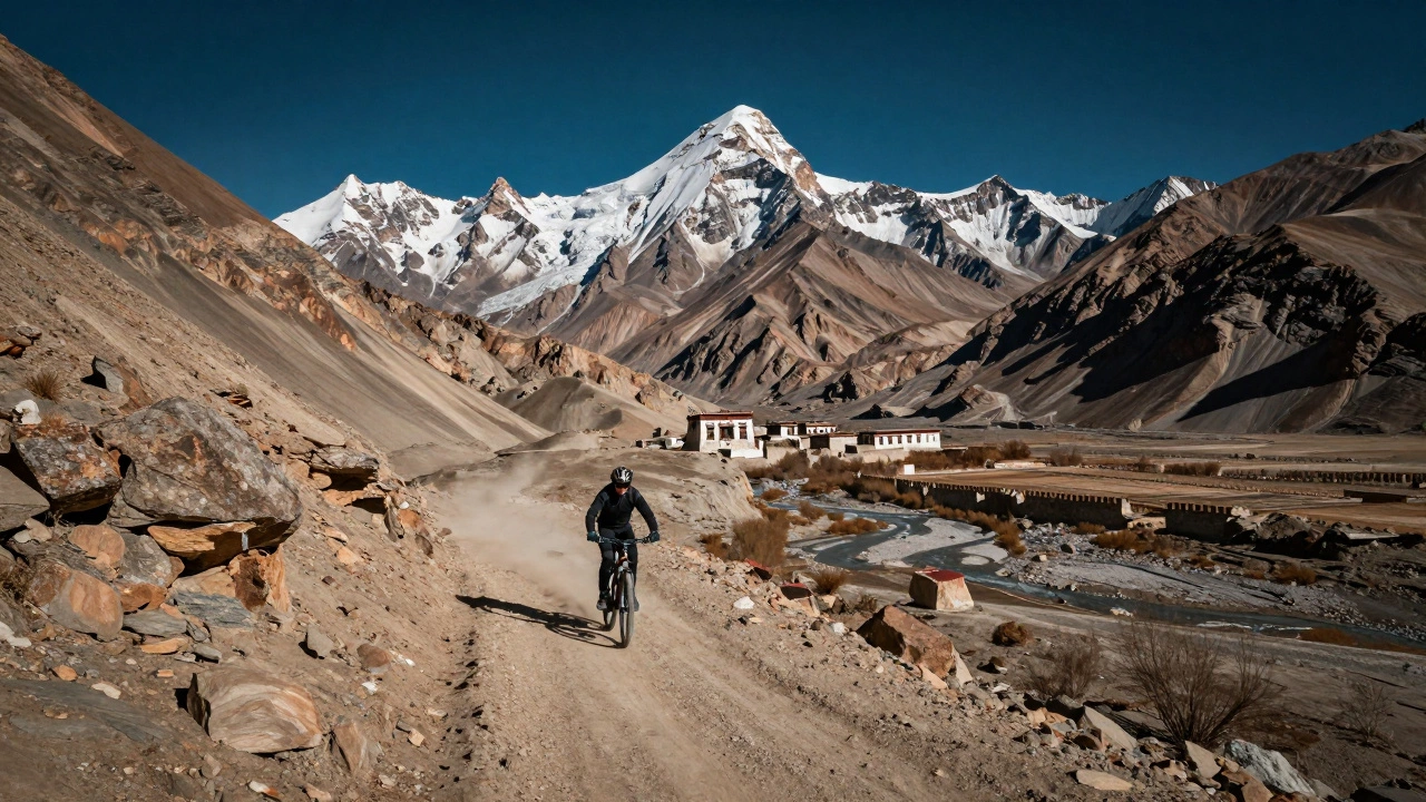 Mountain biker riding trails in snowy Ladakh landscape