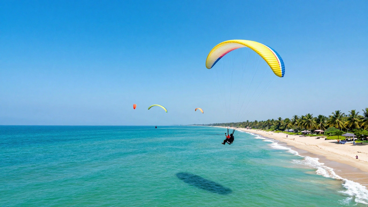 Paragliders flying over the sea and beaches of Goa